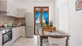 Cucina con patio - Casa vacanze GessuminuImage