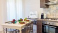 Living room with open kitchen - Ficarazzi ApartmentImage