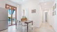 Cucina con patio - Casa vacanze GessuminuImage